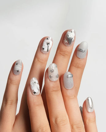 Silver Spoon short oval nails with grey marble base and liquid chrome spoon charm