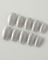 Silver White Cat-eye Nails press-on nails in extra short almond shape — silver white cat eye