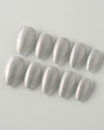 Silver White Cat-eye Nails press-on nails in extra short almond shape — silver white cat eye