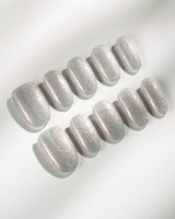 Silver White Cat-eye Nails press-on nails in medium oval shape — silver white cat eye