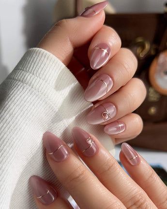 Simple love press-on nails — Gentle Blush Cat Eye, Simple Gold Lines & 3D Hearts. handmade nail art by Joyee Nails