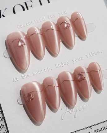 Simple love press-on nails — Gentle Blush Cat Eye, Simple Gold Lines & 3D Hearts. handmade nail art by Joyee Nails