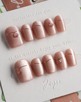 Simple love press-on nails — Gentle Blush Cat Eye, Simple Gold Lines & 3D Hearts. handmade nail art by Joyee Nails