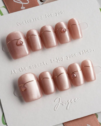 Simple love press-on nails — Gentle Blush Cat Eye, Simple Gold Lines & 3D Hearts. handmade nail art by Joyee Nails