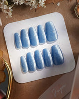 Sky Cat-eye press-on nails in medium coffin shape — blue cat eye nails