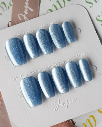 Sky Cat-eye press-on nails in short coffin shape — blue cat eye nails
