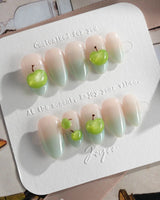 Slushie Apple summer brunch nails with washed-apple gloss and cool blue ombre