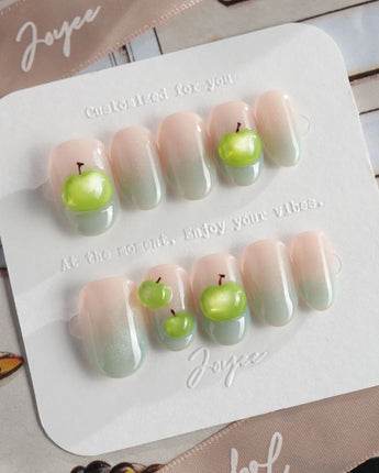 Slushie Apple handmade nails with green apple slices, sheer blue shimmer, and gel shine