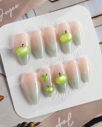 Slushie Apple glossy fruit nails with blue gradient base and crisp apple charms
