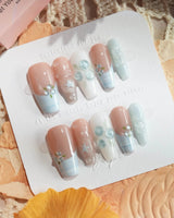 Slushie Blueberry press-on nails with nude cat-eye shine and 3D blueberries