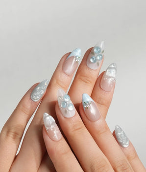 Slushie Blueberry press-on nails with soft nude gel, icy blue texture, and glossy fruit