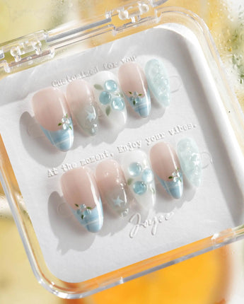 Slushie Blueberry close-up of 3D blueberry charms, icy plaid, and nude cat-eye glow