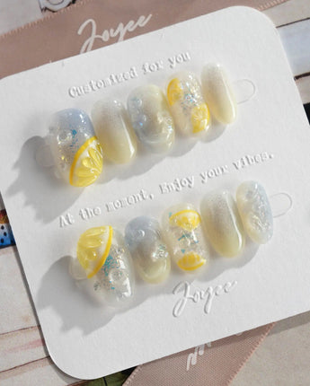 Slushie Lemon minimal fruit nails with translucent slushie texture and yellow citrus charm
