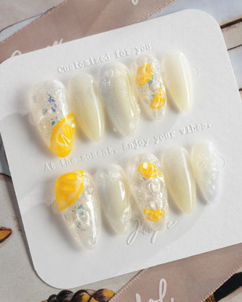 Slushie Lemon close-up of lemon slice nail art on translucent icy gel polish