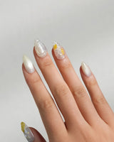 Slushie Lemon soft summer nails with translucent grey white glitter and citrus accents
