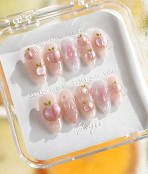 Slushie Peach short almond nail set with juicy peach slices and soft pink shimmer