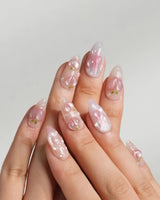 Slushie Peach press-on nails with pink ombre, 3D peaches, and watery gel shine