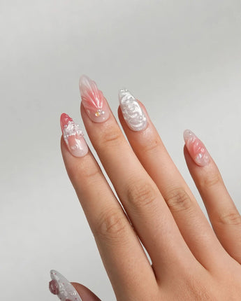 Slushie Strawberry summer nails with pink ombre, translucent shine, and strawberry art
