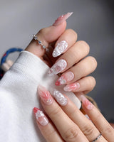 Slushie Strawberry long stiletto nails with soft pink ombre and fruit-soda gloss