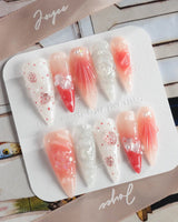 Slushie Strawberry pink-to-white ombre nails with 3D strawberry slices and bubbly texture