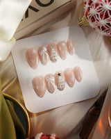 Snowfall press-on nails — pearl nude cat eye snowflake bow silver glitter soft sheen handmade nail art by Joyee Nails
