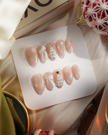 Snowfall press-on nails — pearl nude cat eye snowflake bow silver glitter soft sheen handmade nail art by Joyee Nails