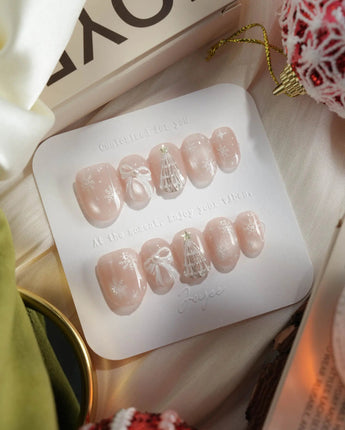 Snowfall press-on nails — pearl nude cat eye snowflake bow silver glitter soft sheen handmade nail art by Joyee Nails