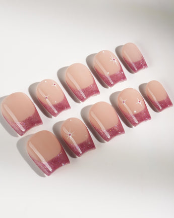 Soft Glow press-on nails in extra short coffin shape — Pinkish Purple Cat Eye, French Glittery Stars.