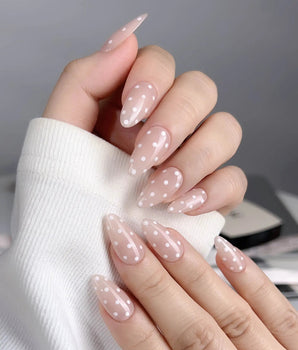 Cloud Cream press-on nail set — Peach Nude, Sweet White Polka Dots. design, hand-painted with real gel polish