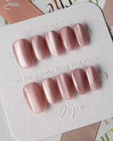 Soft Romance press-on nails in short oval shape — rose pink cat eye magnetic shimmer nails