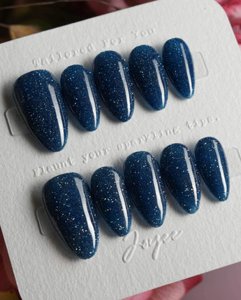 Glitter Glitz Navy press-on nails in short almond shape — deep blue cat eye glitter nails