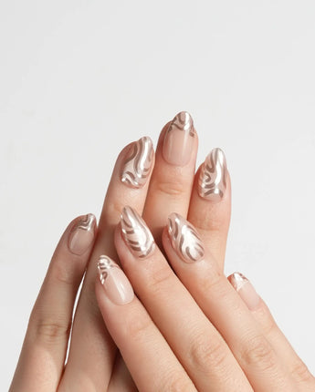 Solar Cycle handmade press-on nails featuring Icy Nude Pink & Rose Gold, 3D Mirror Streamlined Textures & French Tip Accents.