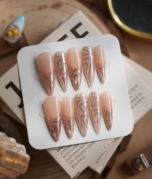 Solar Cycle nails in long stiletto — Icy Nude Pink &