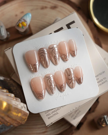 Solar Cycle nails in short almond — Icy Nude Pink &