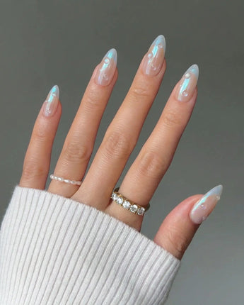 Sparkling Wine short almond nails with glossy blue chrome tips for holiday looks