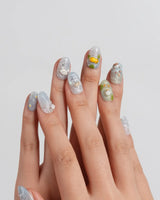 Splash Club handmade 3D animal nails with mint water swirls and bubble accents
