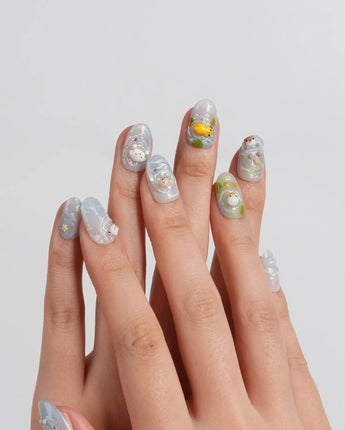 Splash Club handmade 3D animal nails with mint water swirls and bubble accents
