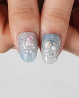Splash Club cute vacation nails with sculpted mini animals and water-ripple gel