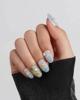 Splash Club short oval press-on nails with playful blue water and animal characters