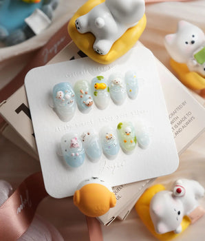 Splash Club handmade animal press-on nails with bunny, duckling, bear, and chick charms