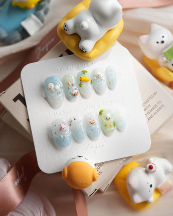 Splash Club handmade animal press-on nails with bunny, duckling, bear, and chick charms