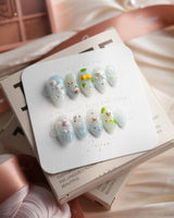 Splash Club pool animal press-on nails in extra short almond shape