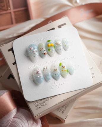 Splash Club pool animal press-on nails in extra short almond shape