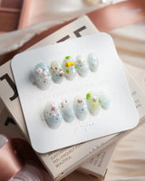 Splash Club pool animal press-on nails in extra short oval shape