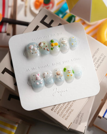 Splash Club pool animal press-on nails in extra short squoval shape