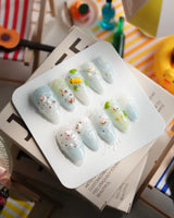 Splash Club pool animal press-on nails in medium almond shape