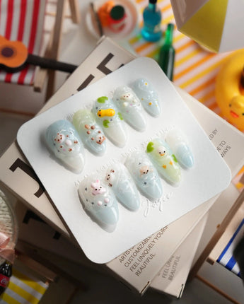 Splash Club pool animal press-on nails in medium almond shape