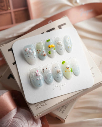 Splash Club pool animal press-on nails in medium oval shape