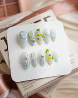 Splash Club pool animal press-on nails in short almond shape