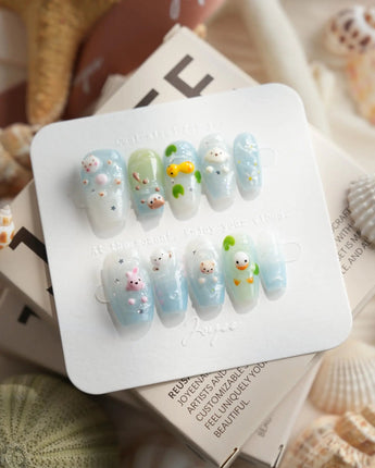 Splash Club pool animal press-on nails in short coffin shape